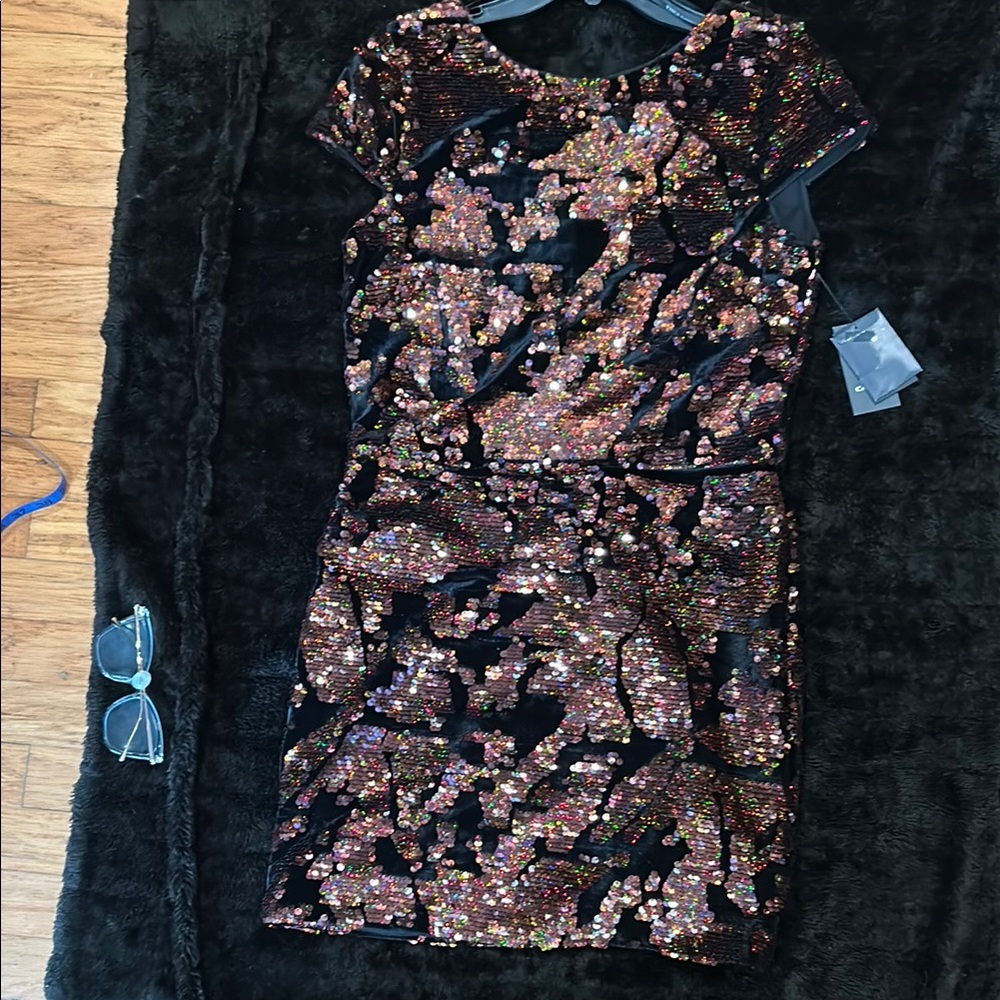 VINCE CAMUTO Brand New with tags. 
Sequins dress very pretty…
